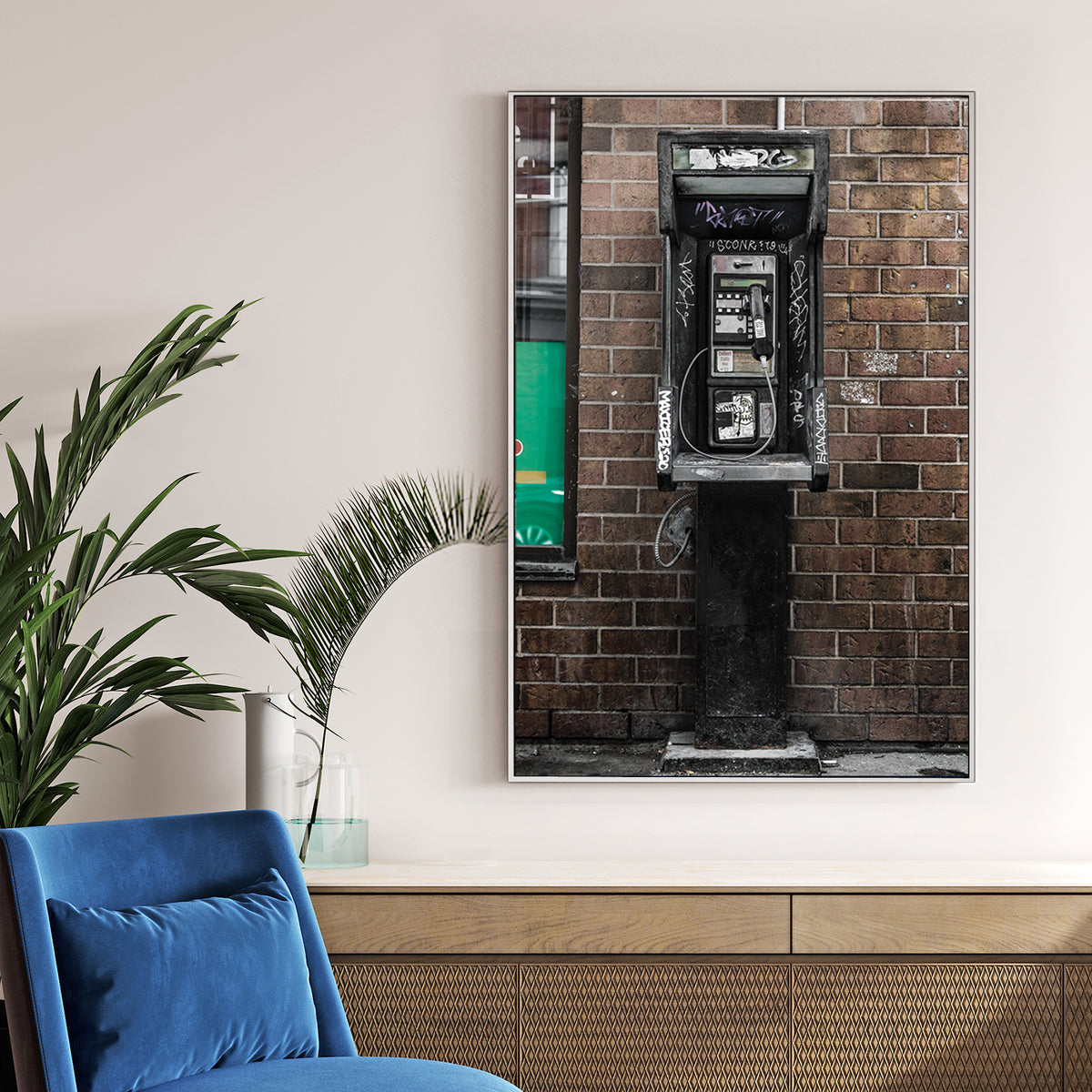 gritty urban phone booth wall art with graffiti and brick wall