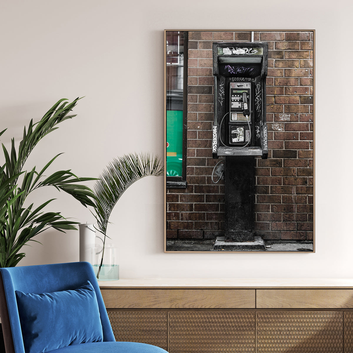 gritty urban phone booth wall art with graffiti and brick wall