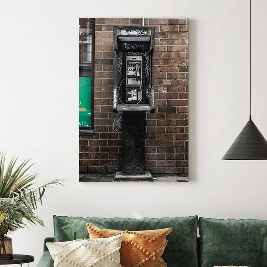 gritty urban phone booth wall art with graffiti and brick wall