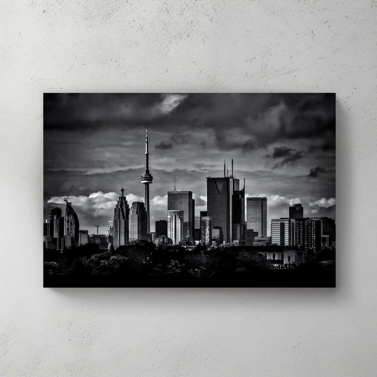 dramatic black and white toronto skyline wall art with stormy clouds