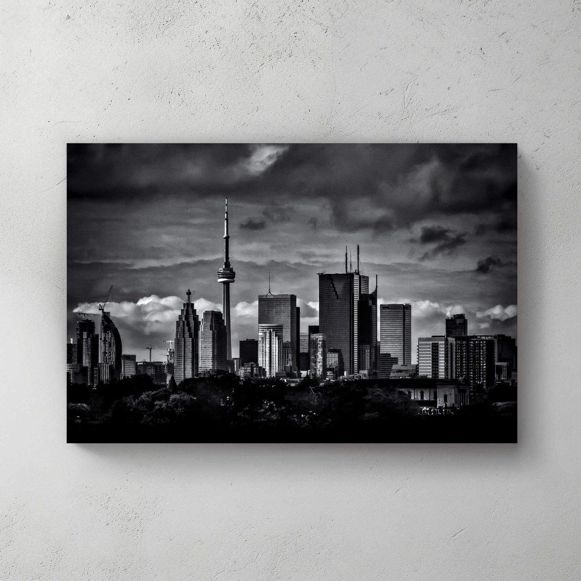 dramatic black and white toronto skyline wall art with stormy clouds