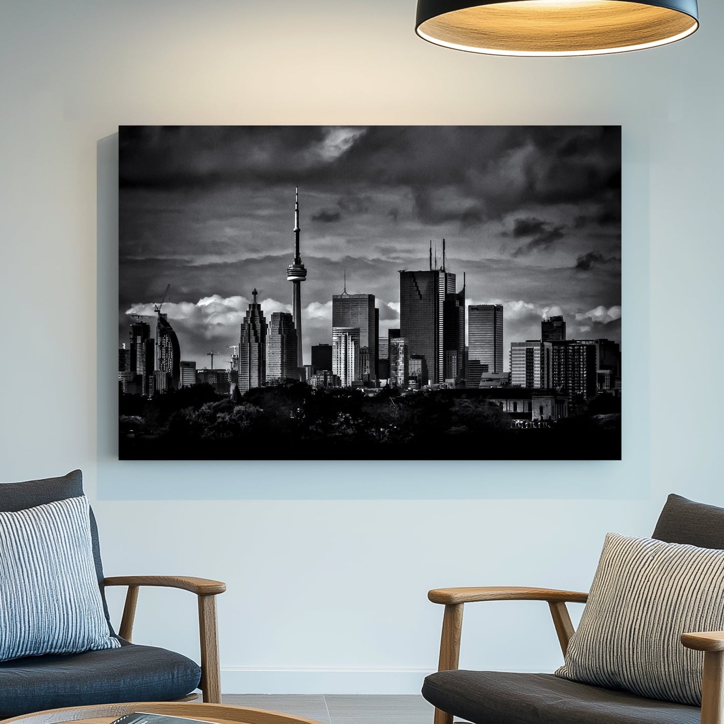 dramatic black and white toronto skyline wall art with stormy clouds
