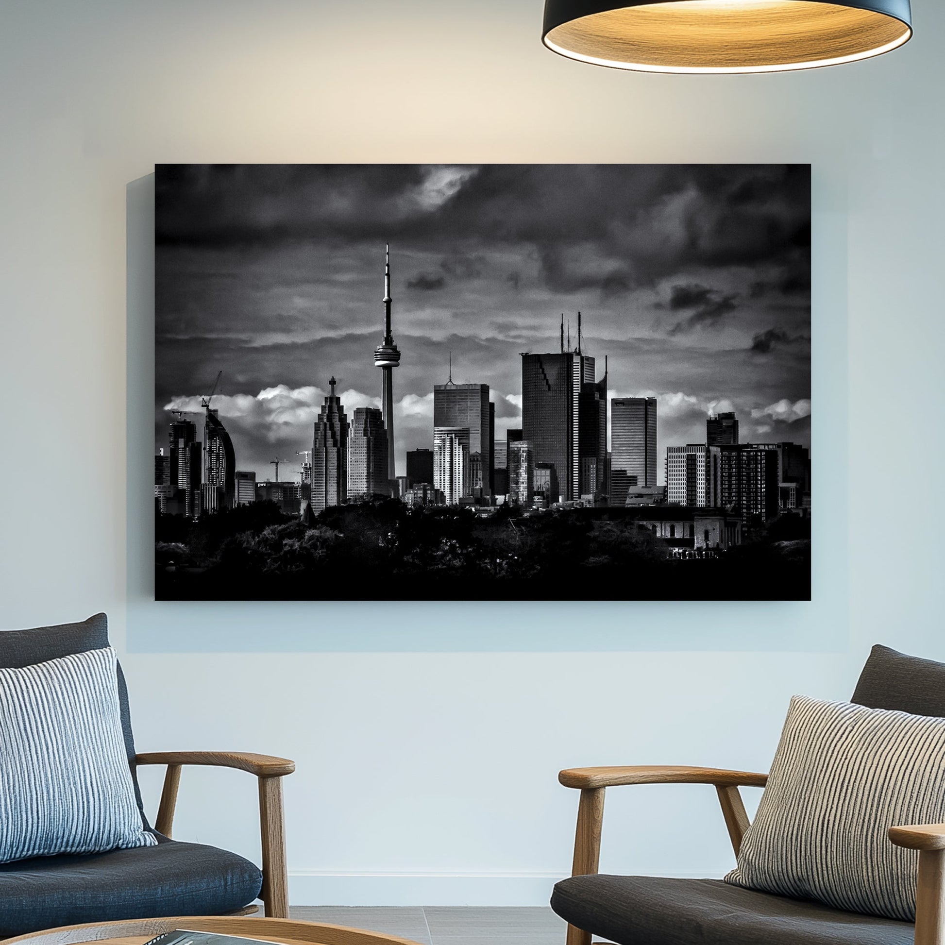 dramatic black and white toronto skyline wall art with stormy clouds