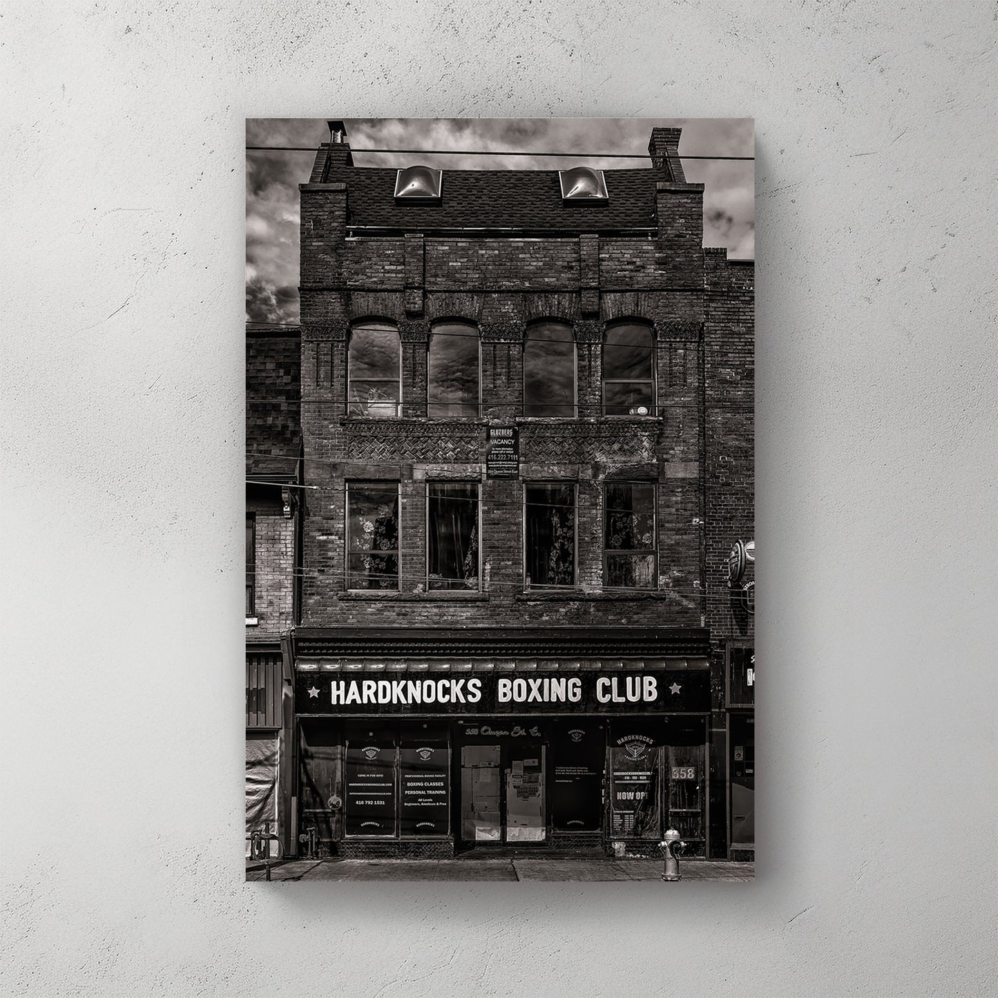 black and white photo of historic boxing club storefront in Toronto
