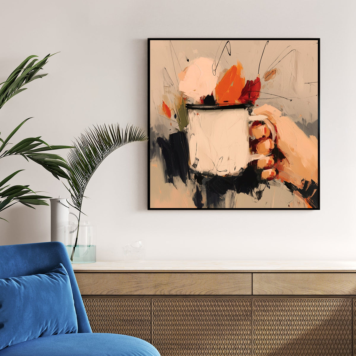 autumn-inspired wall art with hand holding mug and warm abstract brushstrokes