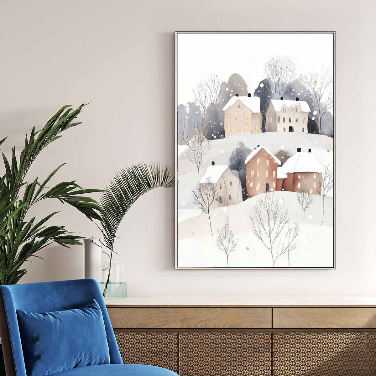 snowy hillside village wall art with glowing windows and minimalist winter trees