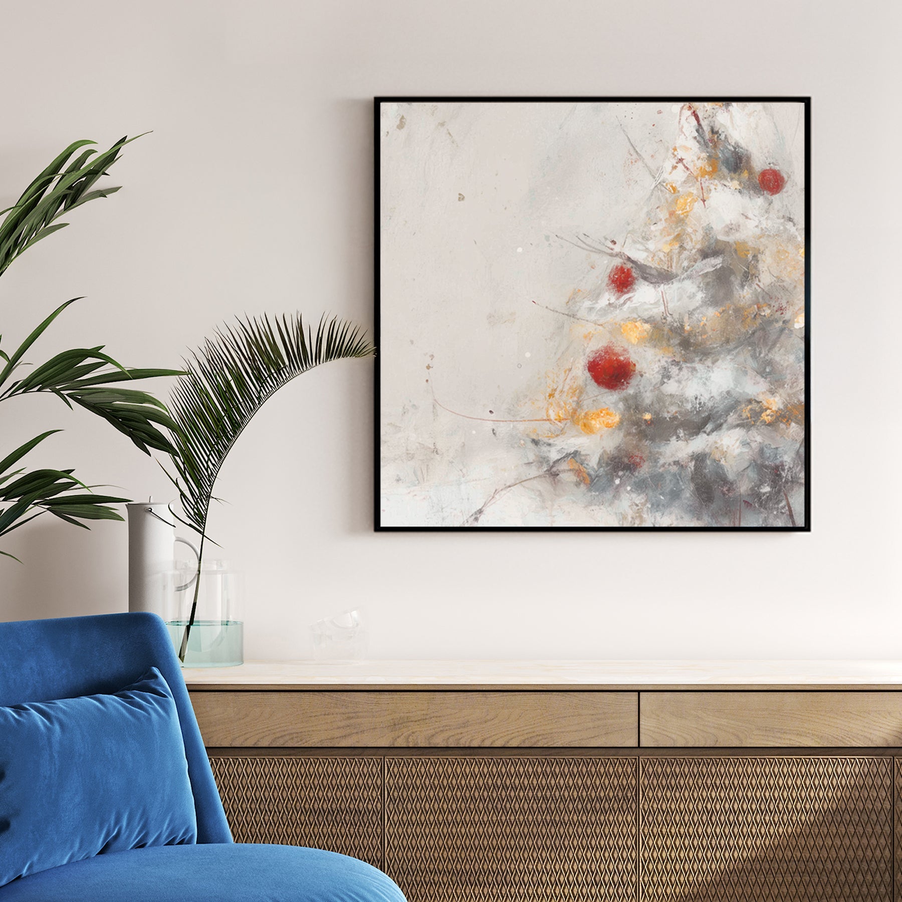 minimalist Christmas tree wall art with red and gold ornaments on snowy branches