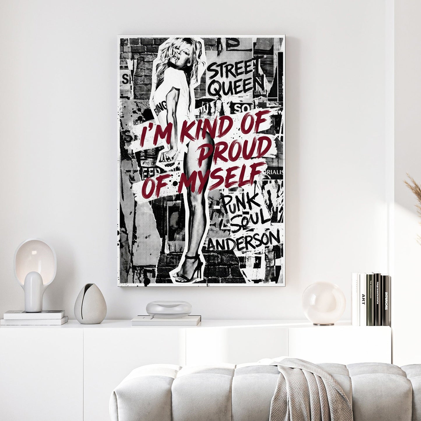 Pamela Anderson street art wall art with bold red typography and monochrome collage layers.