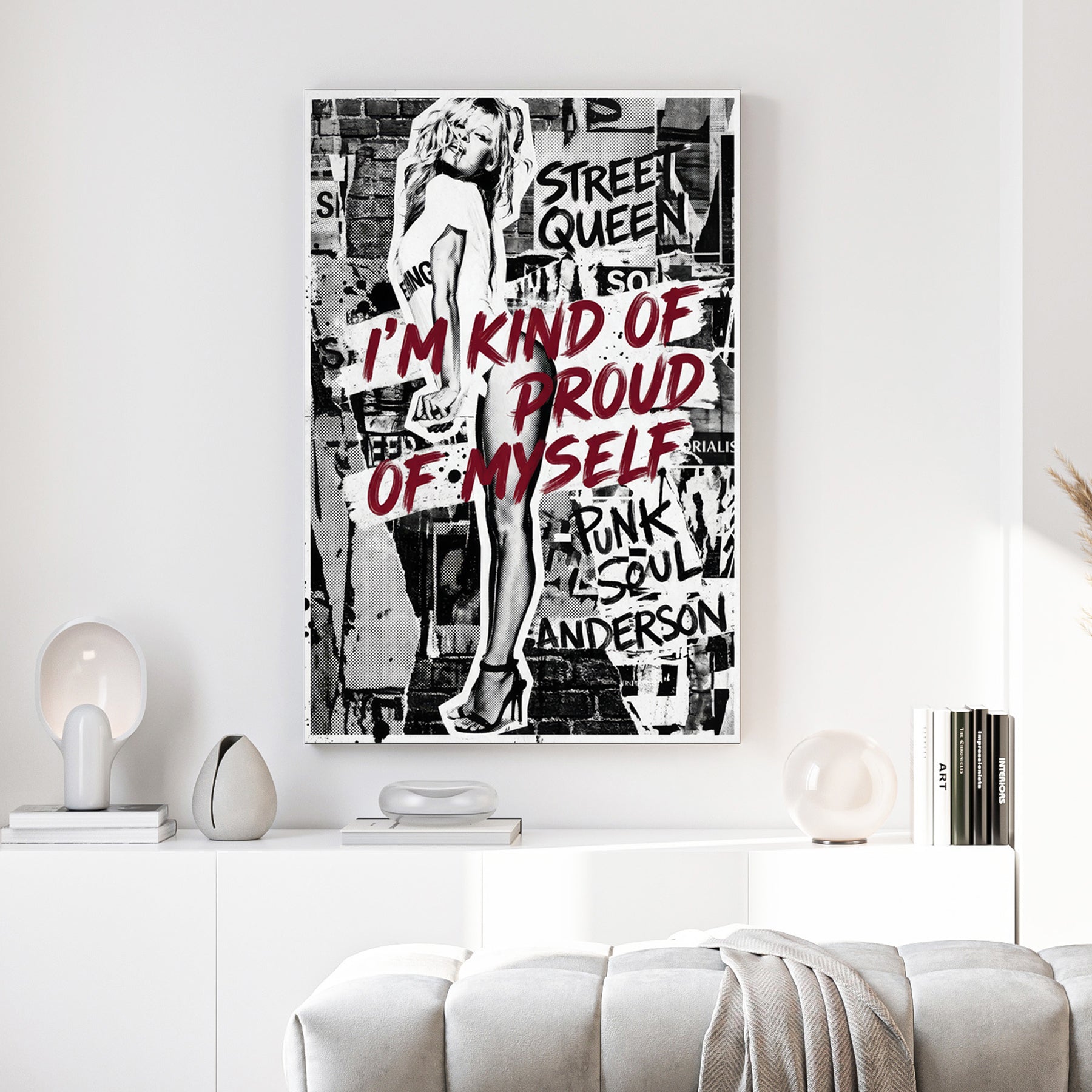 Pamela Anderson street art wall art with bold red typography and monochrome collage layers.