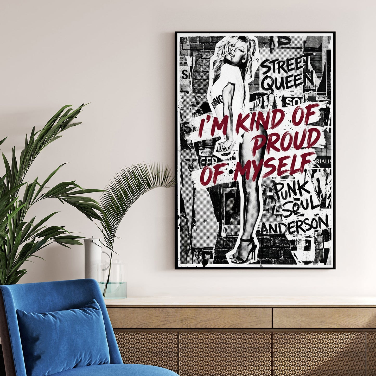 Pamela Anderson street art wall art with bold red typography and monochrome collage layers.