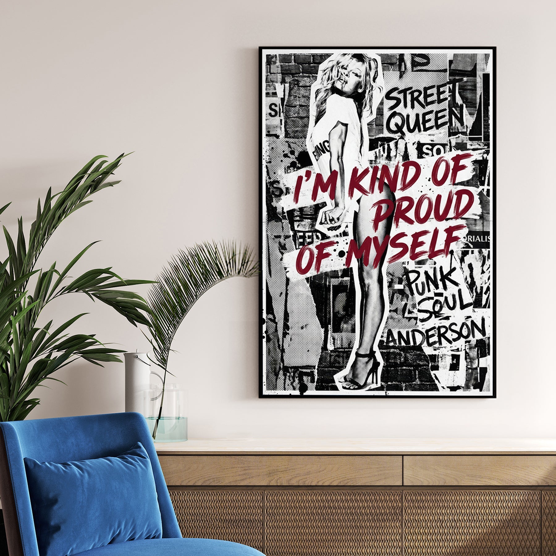 Pamela Anderson street art wall art with bold red typography and monochrome collage layers.