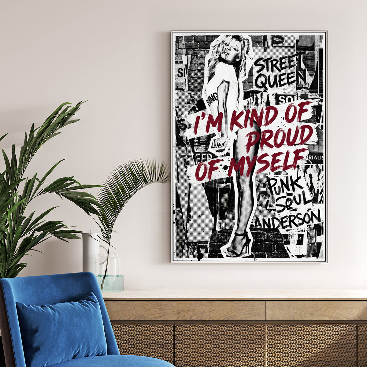 Pamela Anderson street art wall art with bold red typography and monochrome collage layers.