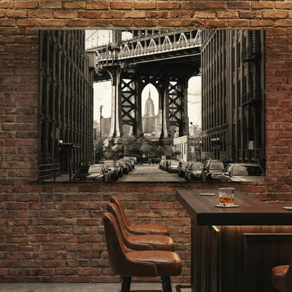 Sepia photography of Manhattan Bridge framing the Empire State Building urban wall art.