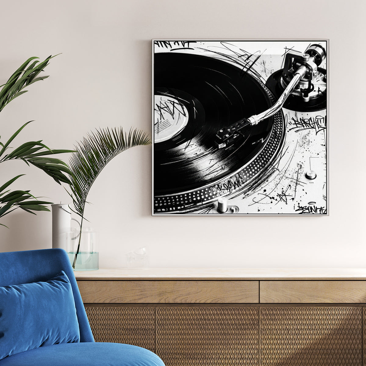Black and white Technics SL-1200 turntable wall art with graffiti doodles and vinyl record.