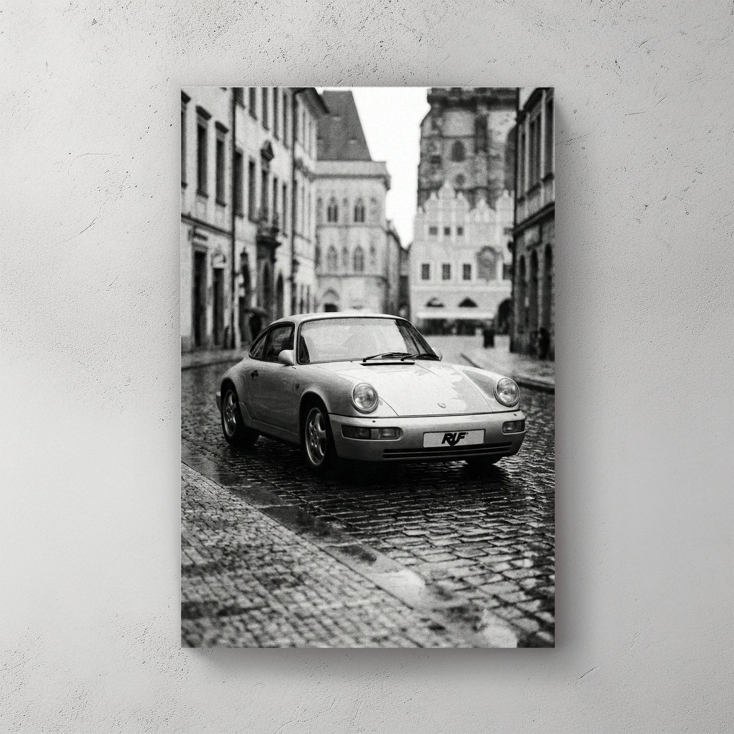 Monochrome RUF Porsche 911 on a European cobblestone street wall art.