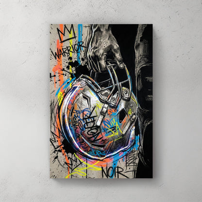 Football helmet wall art featuring a hand-held helmet with graffiti and street art details.
