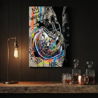 Football helmet wall art featuring a hand-held helmet with graffiti and street art details.