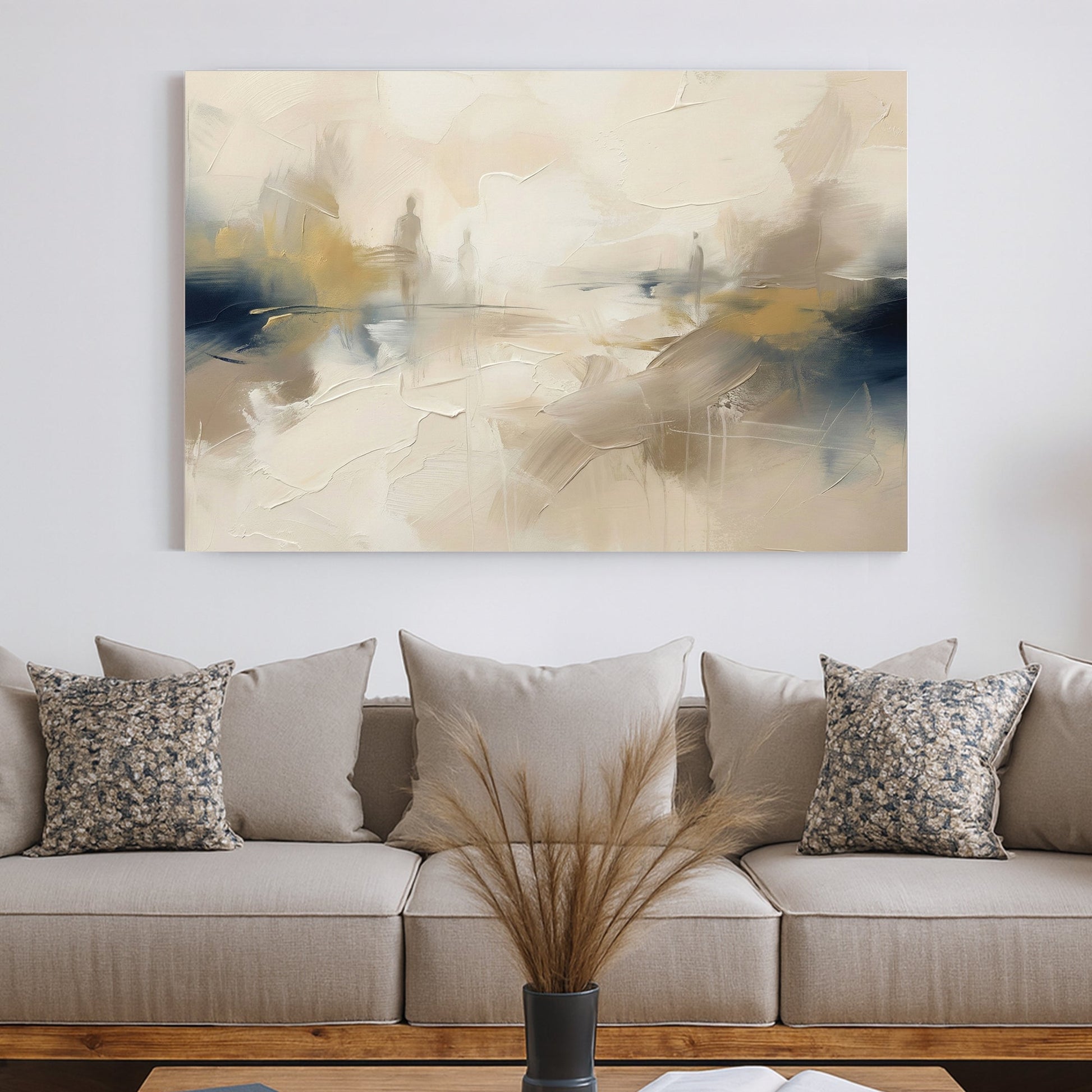 Abstract figures in a neutral landscape wall art with navy and beige tones.