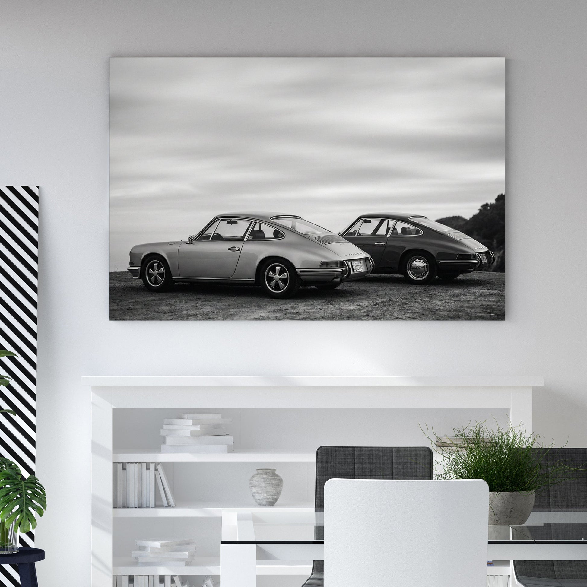 Two vintage Porsche 911 cars in black and white photography wall art.
