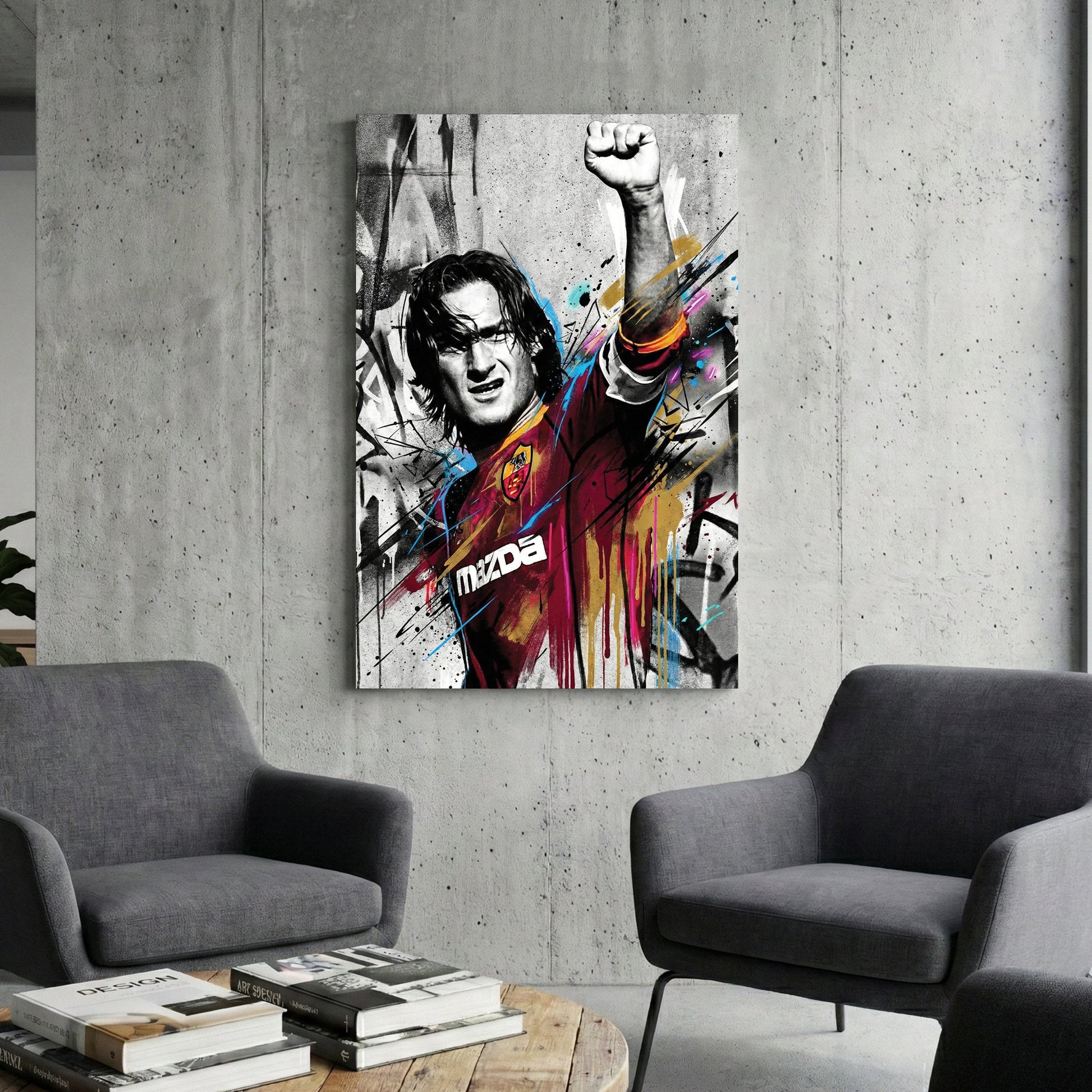 Francesco Totti street art wall art with raised fist and colourful urban drips.