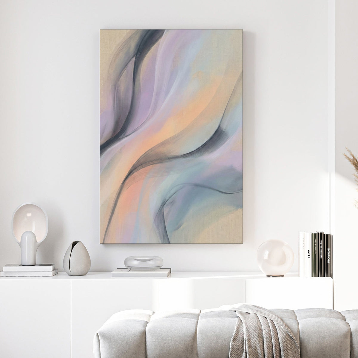 Abstract wall art featuring flowing lavender, peach, and charcoal waves on a beige background.