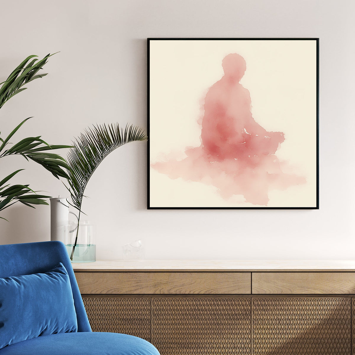 Minimalist pink watercolour Meditating Buddha wall art in a lotus pose on cream background.