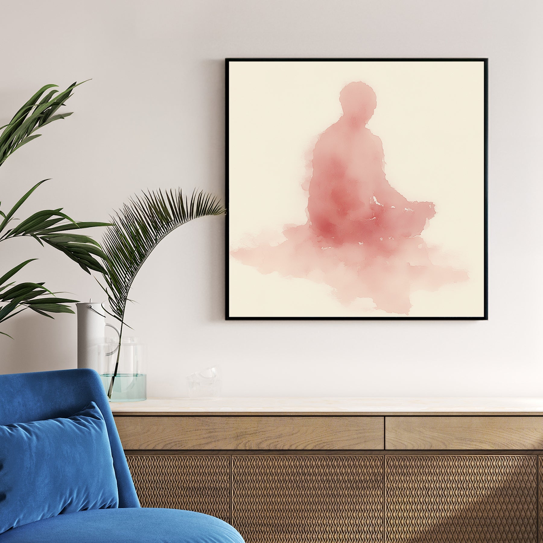 Minimalist pink watercolour Meditating Buddha wall art in a lotus pose on cream background.