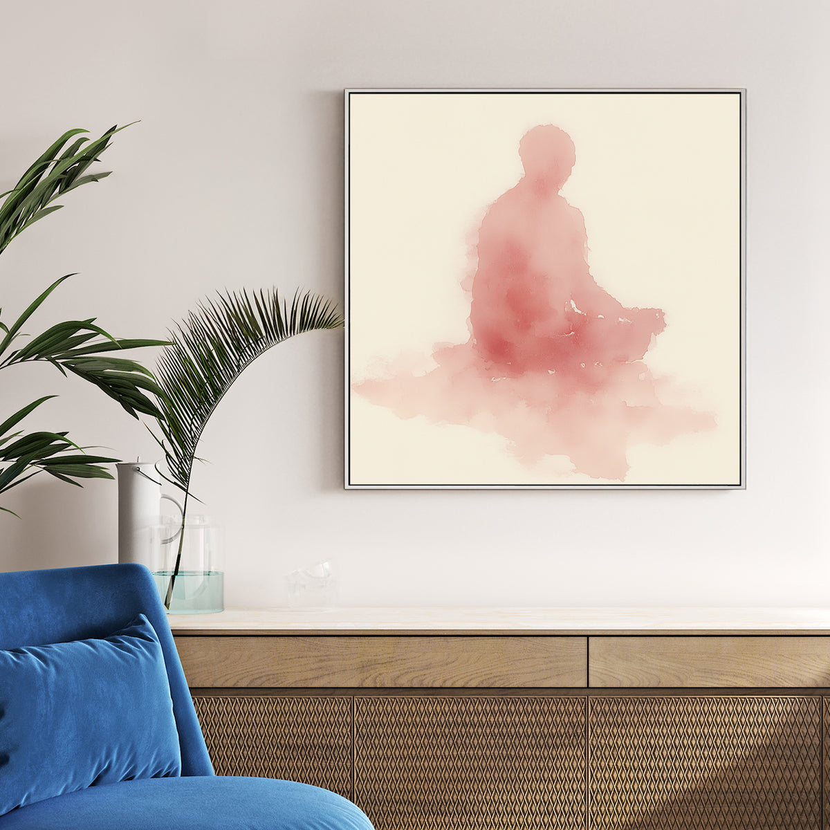 Minimalist pink watercolour Meditating Buddha wall art in a lotus pose on cream background.