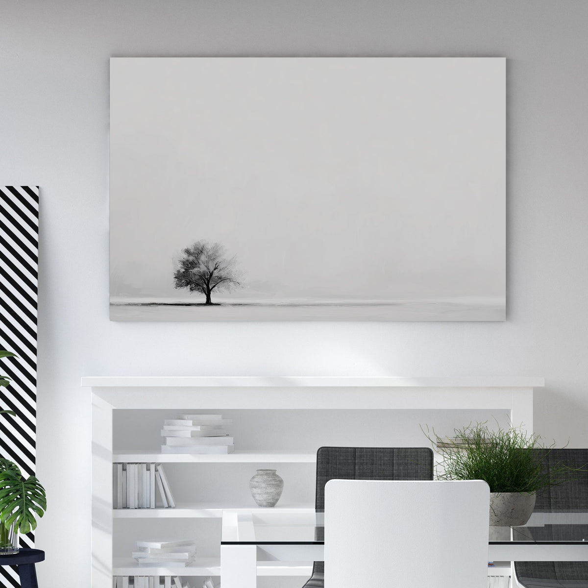Minimalist wall art featuring a single tree in a monochrome landscape.