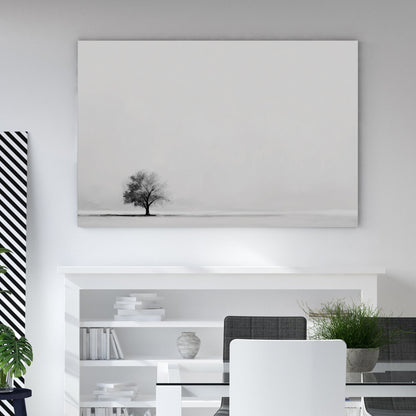 Minimalist wall art featuring a single tree in a monochrome landscape.