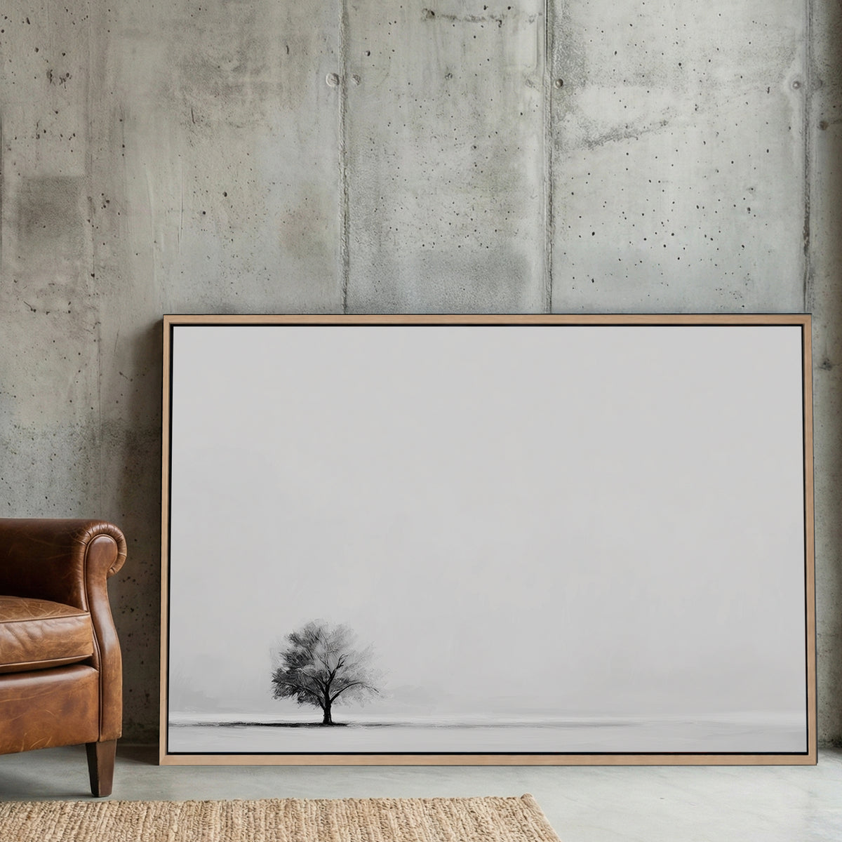 Minimalist wall art featuring a single tree in a monochrome landscape.