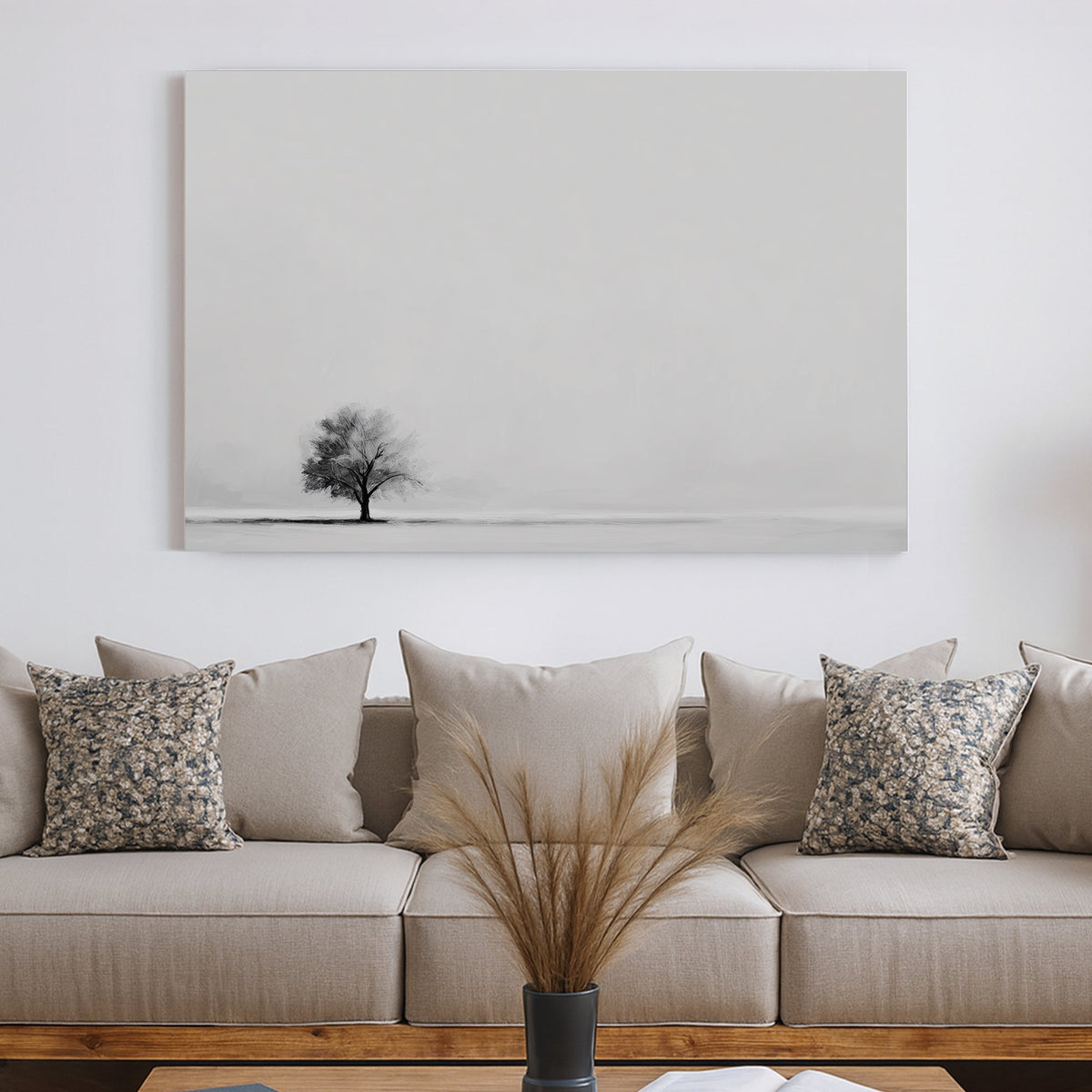 Minimalist wall art featuring a single tree in a monochrome landscape.