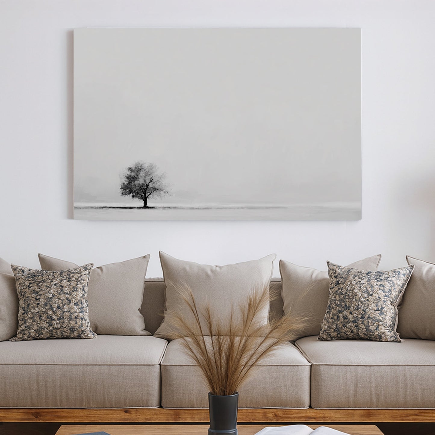 Minimalist wall art featuring a single tree in a monochrome landscape.