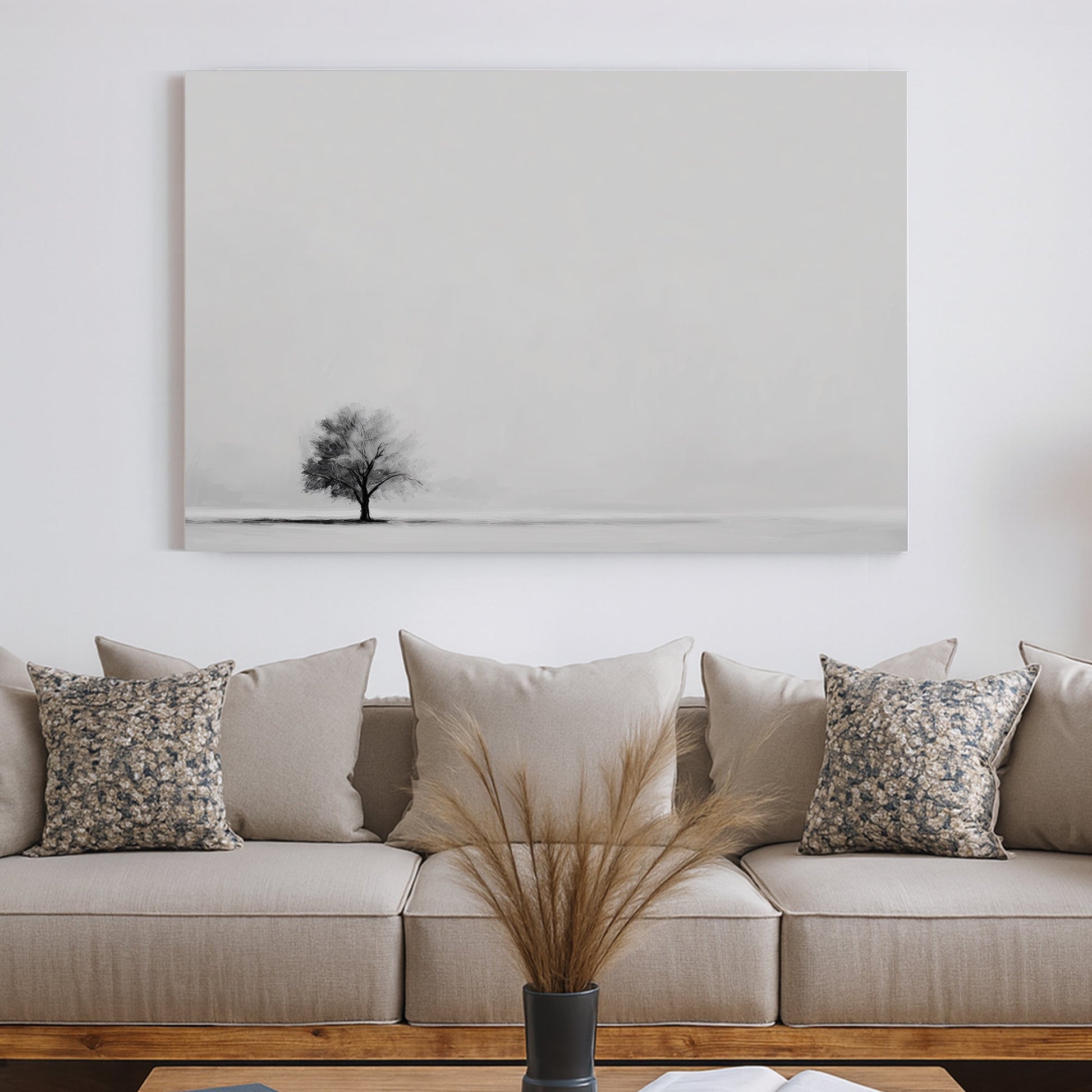 Minimalist wall art featuring a single tree in a monochrome landscape.