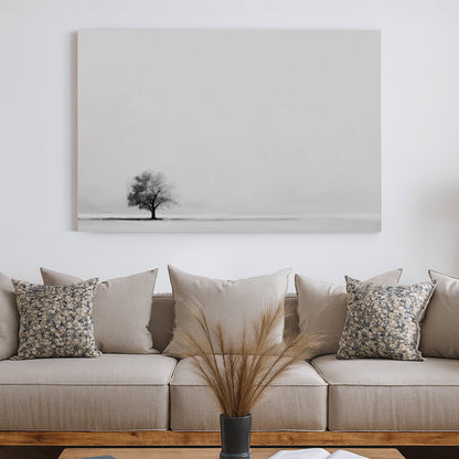 Minimalist wall art featuring a single tree in a monochrome landscape.