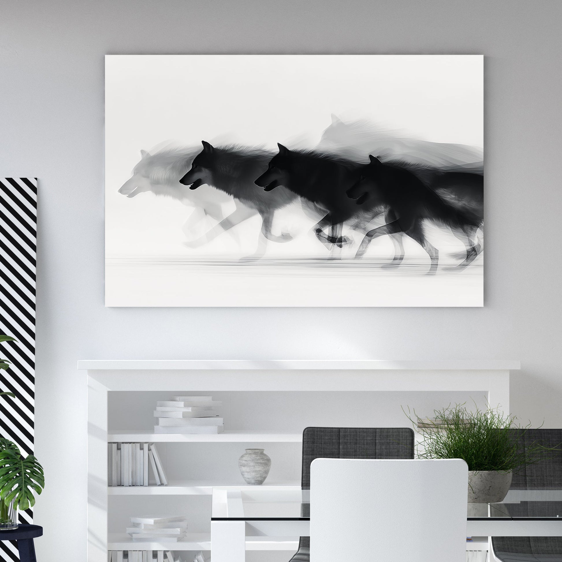 Minimalist wall art of a running wolf pack in black and white with motion blur.