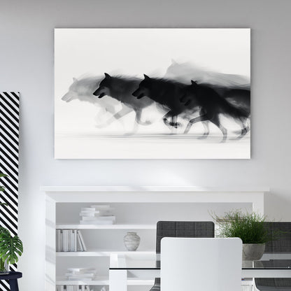 Minimalist wall art of a running wolf pack in black and white with motion blur.