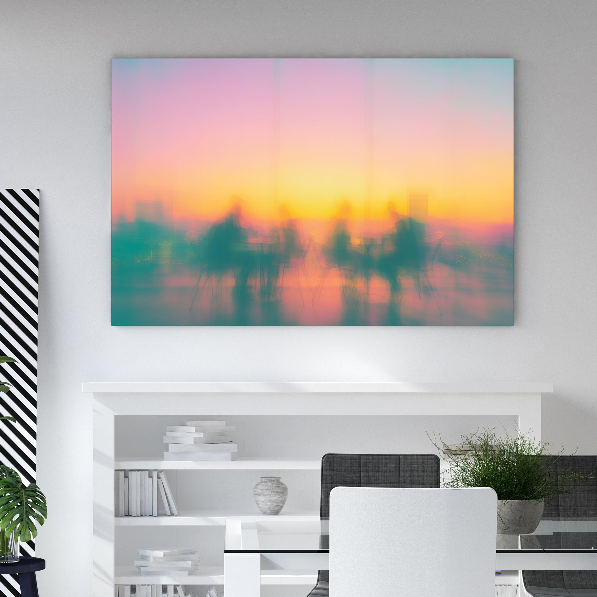 Blurred silhouettes of people at cafe tables during a colourful sunset wall art