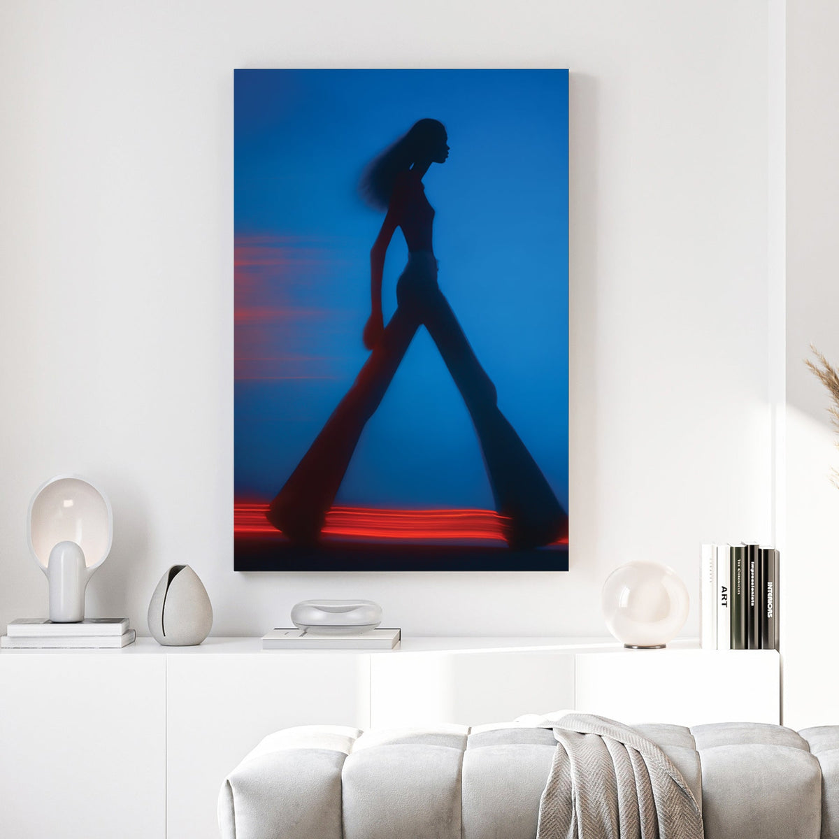 Blurred silhouette of a fashion model walking with red light trails wall art.