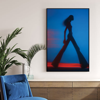 Blurred silhouette of a fashion model walking with red light trails wall art.