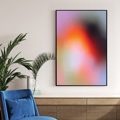 Blurred abstract gradient wall art with pink, orange, and purple soft tones.
