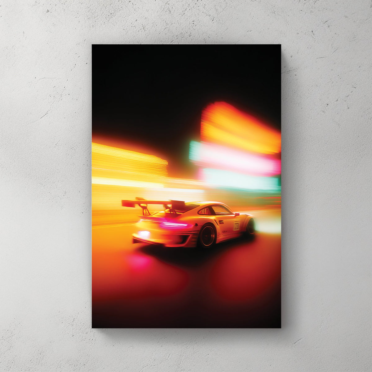 Motion blurred Porsche 911 racing through city lights wall art.