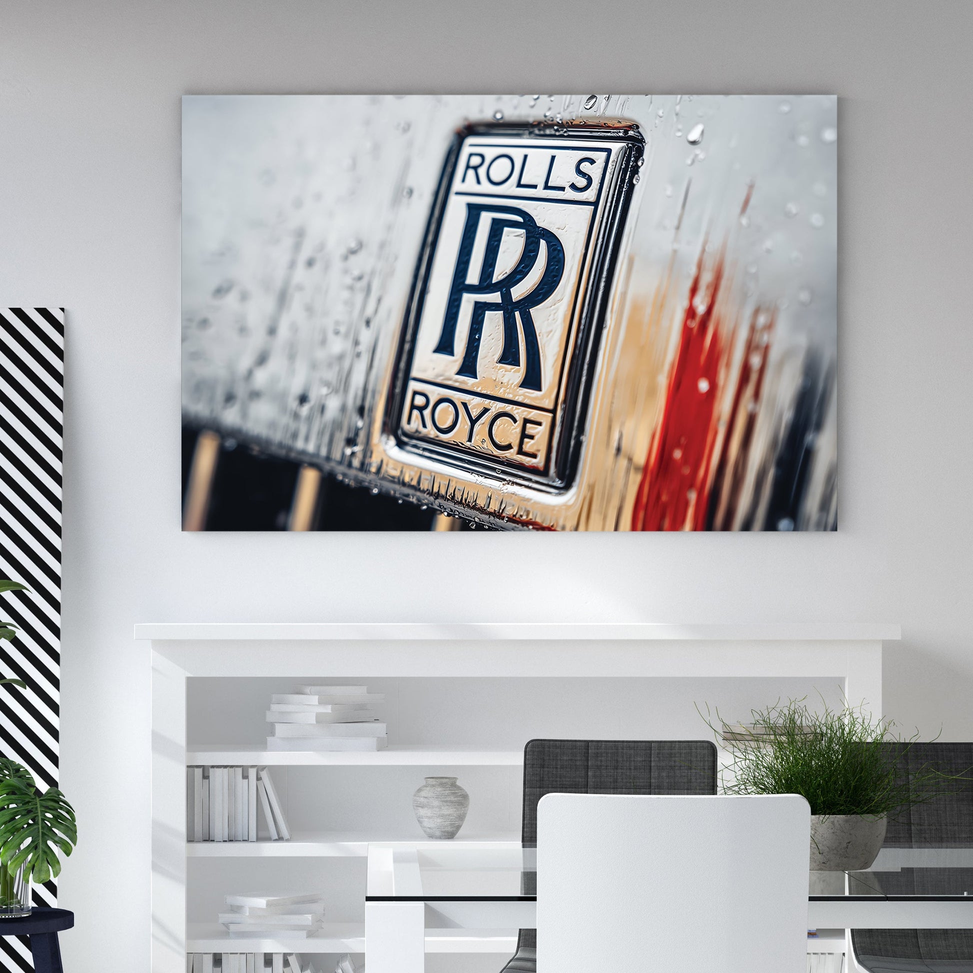 Macro shot of a Rolls-Royce badge with water droplets and a red highlight wall art.