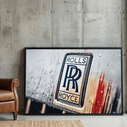 Macro shot of a Rolls-Royce badge with water droplets and a red highlight wall art.