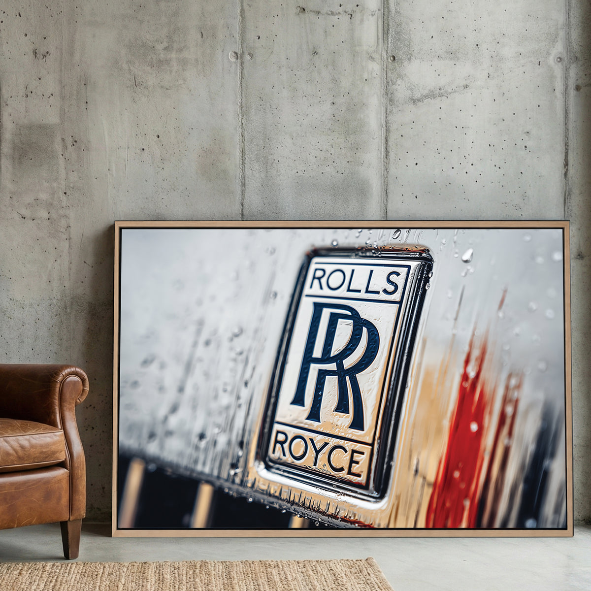 Macro shot of a Rolls-Royce badge with water droplets and a red highlight wall art.