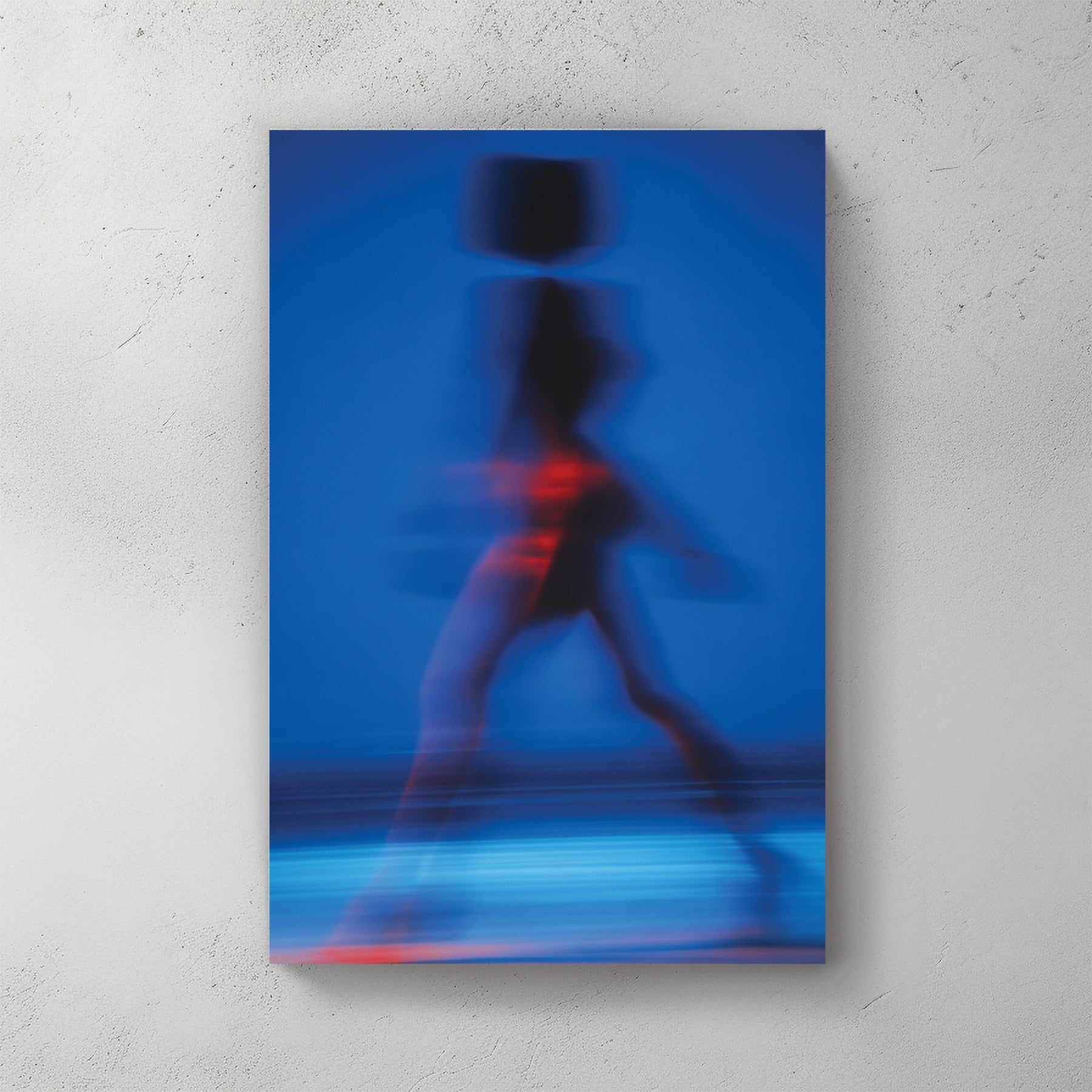 Abstract motion blur photography of a silhouette walking in blue wall art.