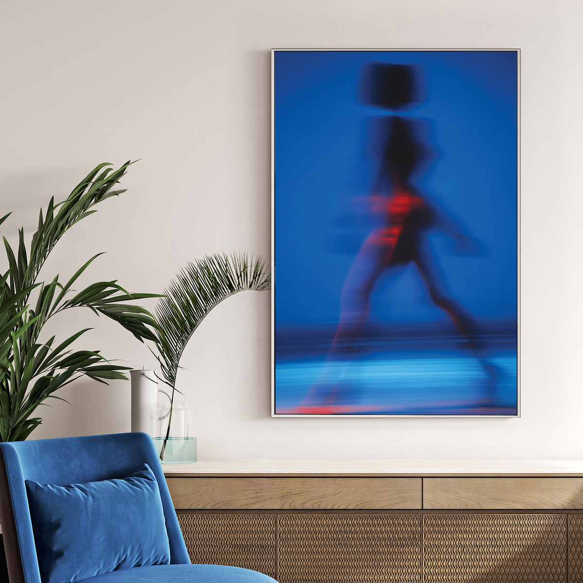 Abstract motion blur photography of a silhouette walking in blue wall art.