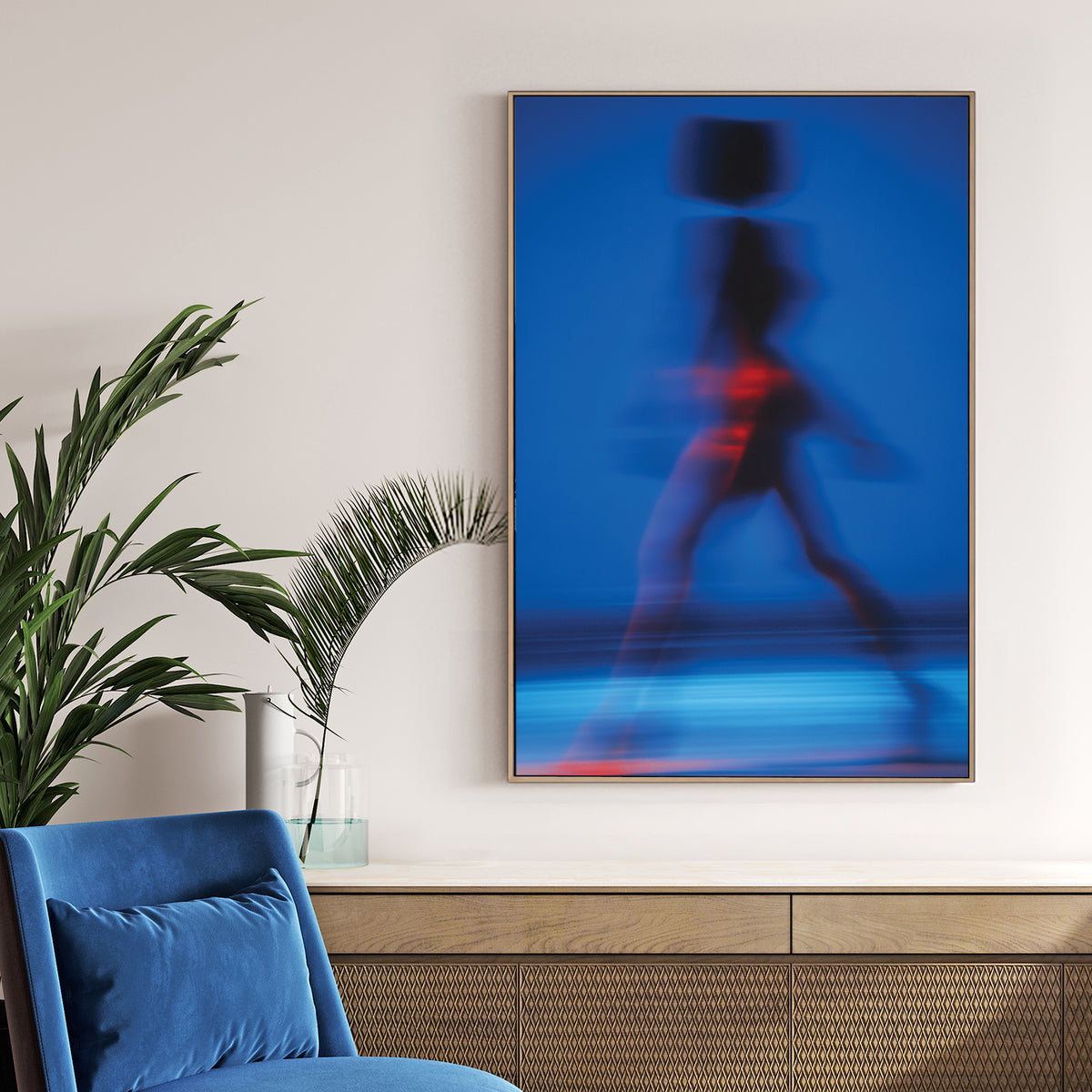 Abstract motion blur photography of a silhouette walking in blue wall art.
