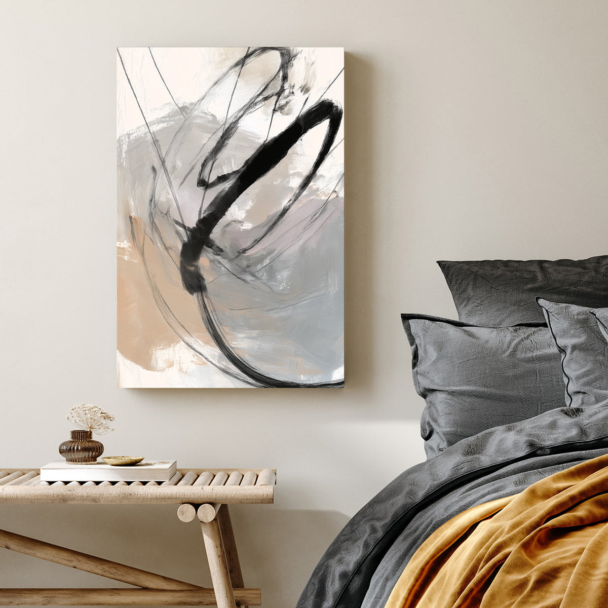 Abstract minimalist wall art with bold black sweeping lines on a beige and grey background.