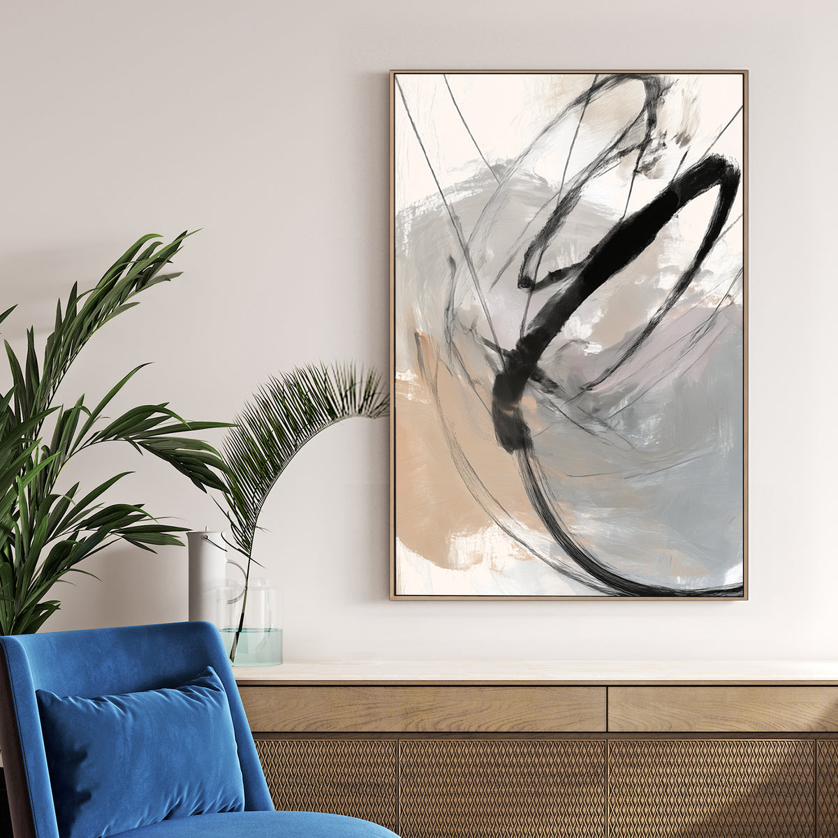 Abstract minimalist wall art with bold black sweeping lines on a beige and grey background.